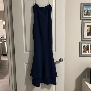 Likely strapless dress in navy blue. I typically wear a 6 in dresses.